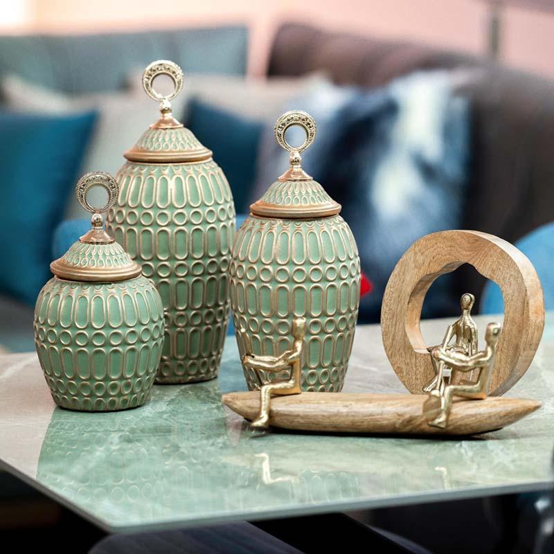 ΜΕΤΑΛΛΙΚΟ ΕΠΙΤΡΑΠΕΖΙΟ ΔΙΑΚΟΣΜΗΤΙΚΟ Fylliana "Man alone" ΧΡΥΣΟ ΧΡΩΜΑ ΜΕ ΞΥΛΙΝΗ ΒΑΣΗ 19x7x20εκ sls