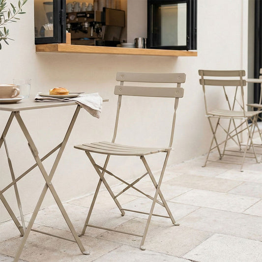 Καρέκλα Bistro pakoworld μεταλλική αναδιπλούμενη σε σαμπανί 42x46x82εκ